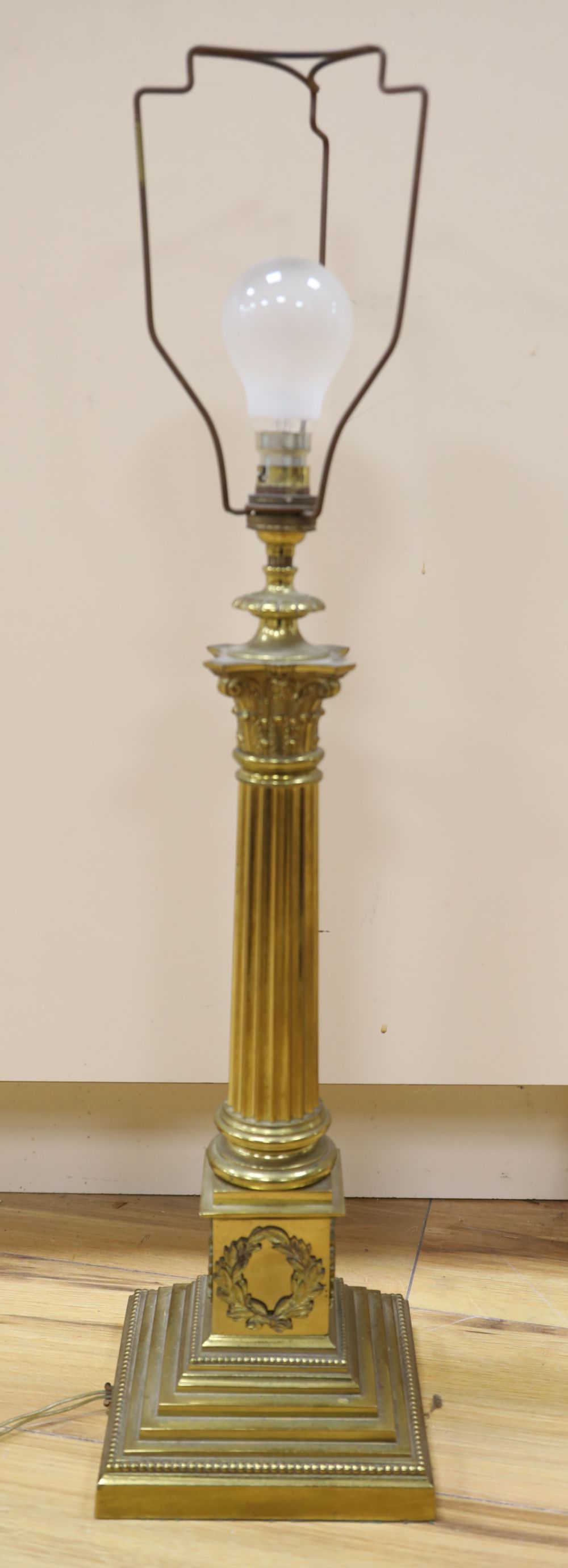 A brass corinthian column table lamp, height 47cm